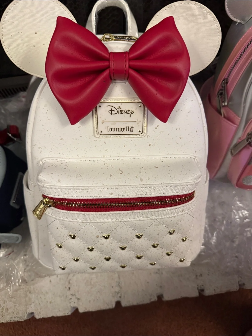 Loungefly White Mini Backpack with Red Bow Accent